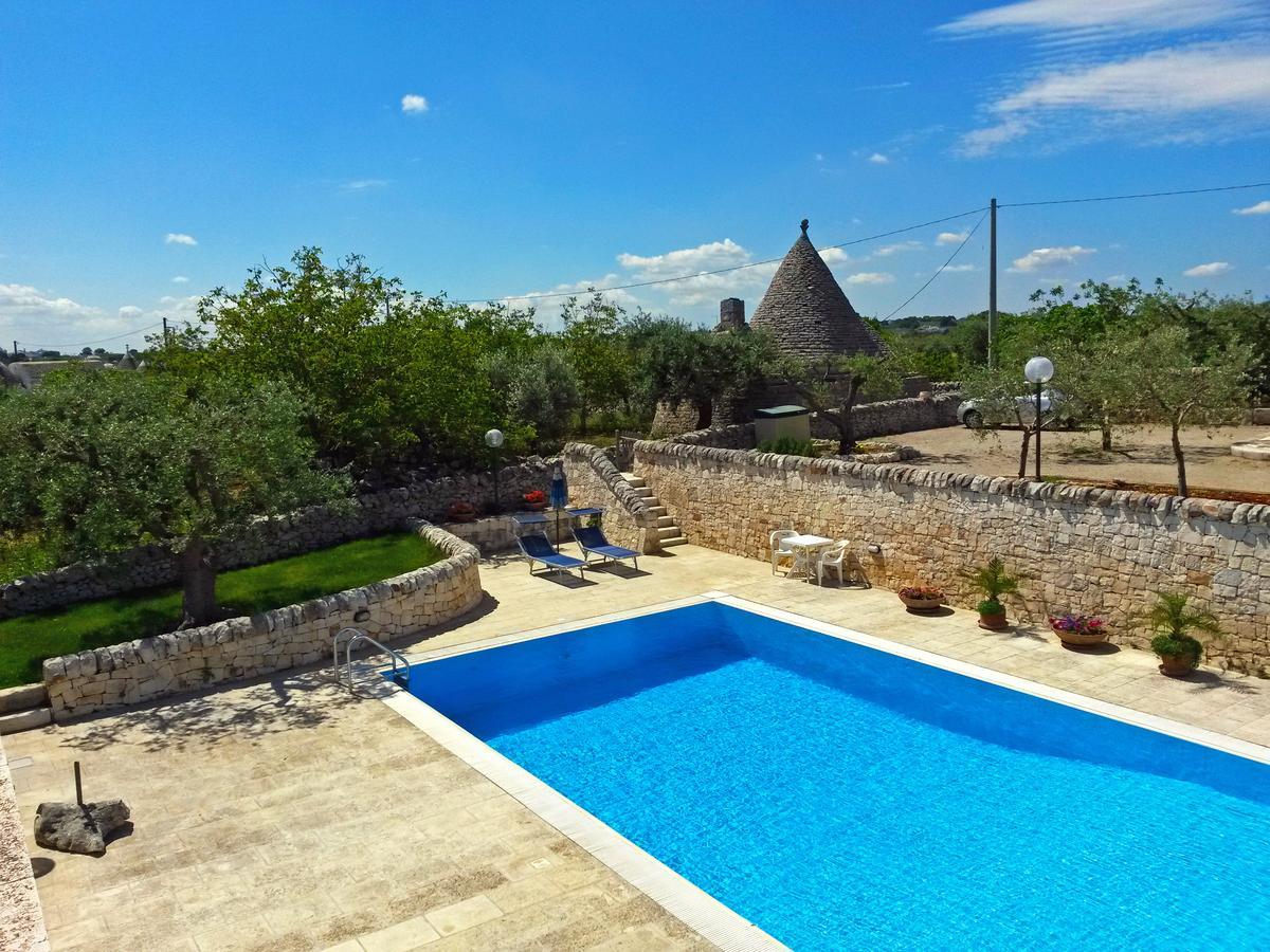 I Trulli Degli Ulivi Villa โลโกโรตอนโด ภายนอก รูปภาพ
